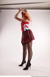 TINA STANDING POSE WITH BASEBALL BAT